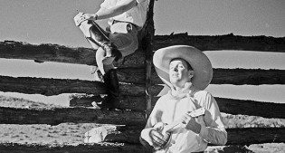 Charles Belden photo of a cowboy serenading a cowgirl, ca. 1930s. MS3 Charles Belden Collection. PN.67.799
