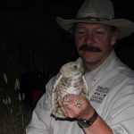 Dr. Preston with a burrowing owl