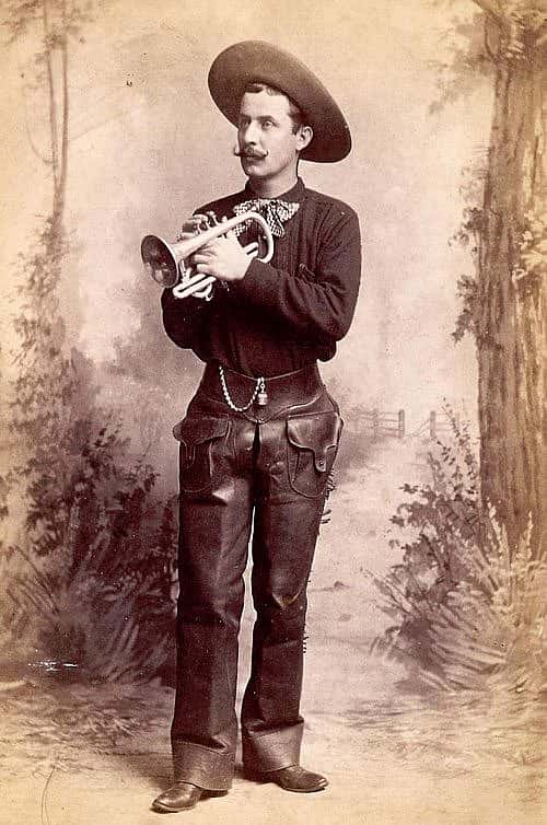 Band leader of Buffalo Bill's Cowboy Band, William Sweeney, in uniform with cornet, ca. 1887. Cabinet photograph. Gift of Mr. and Mrs. George Strobel. P.6.55