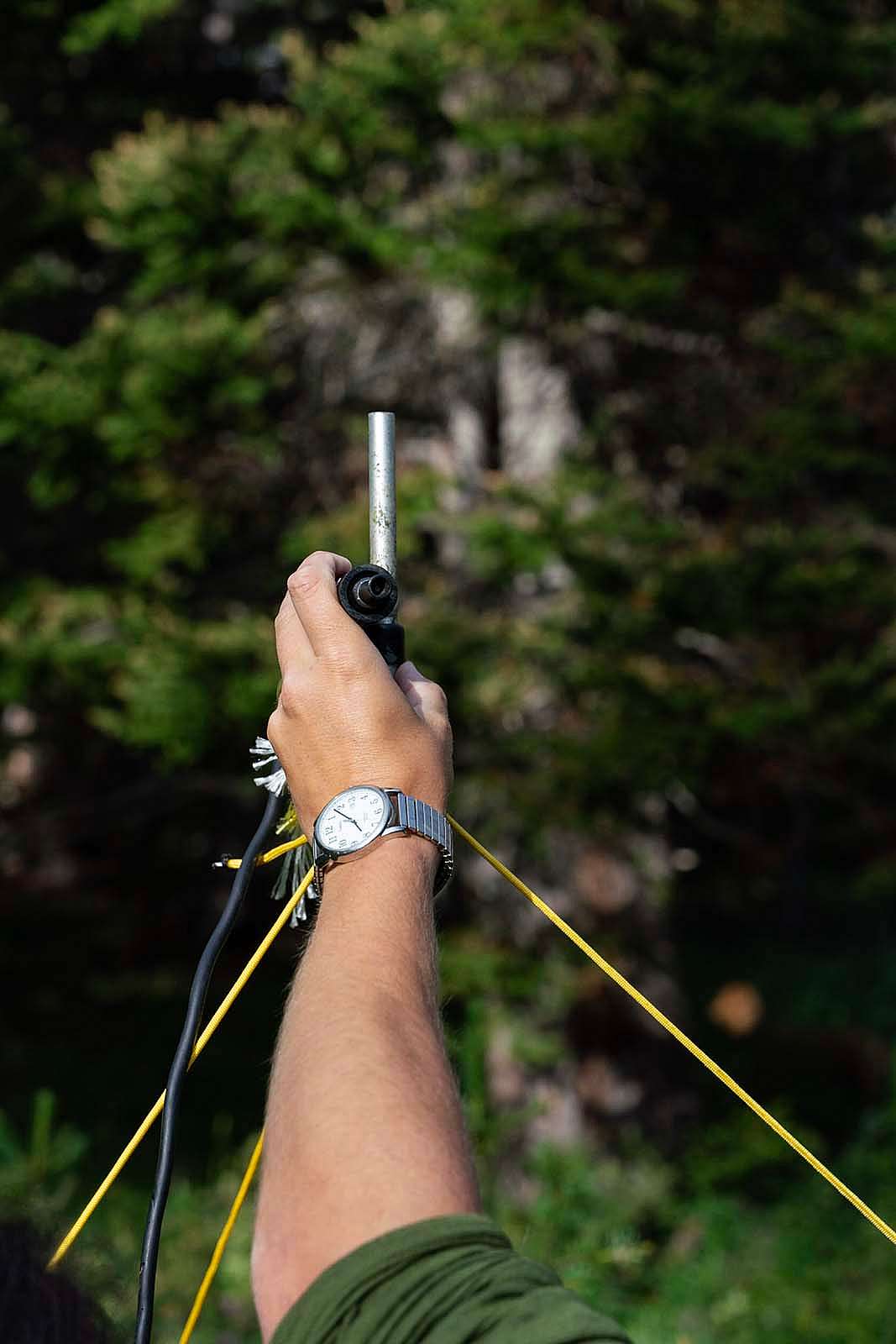 Adjusting where the microphone points.