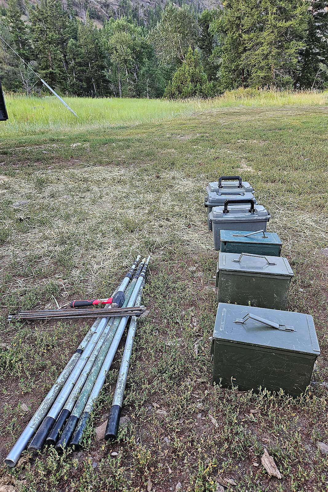 Bat housing units and poles ready to be packed up into the mountains.