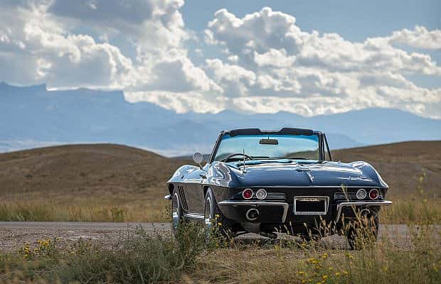 2024Car-rear Black, 1966 Corvette convertible raffle car from the back.