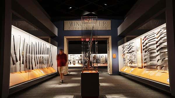 Cody Firearms Museum A visitor walks along the Cody Firearms Museum, a popular gun museum in Cody, WY.