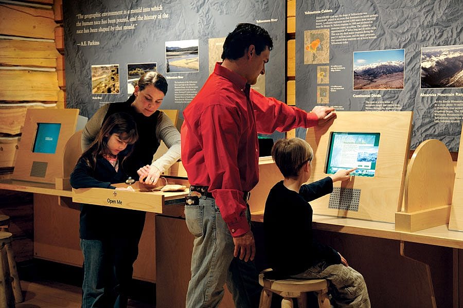 Visitors enjoy engaging and interactive activities at the trailhead of the Draper Museum of Natural History