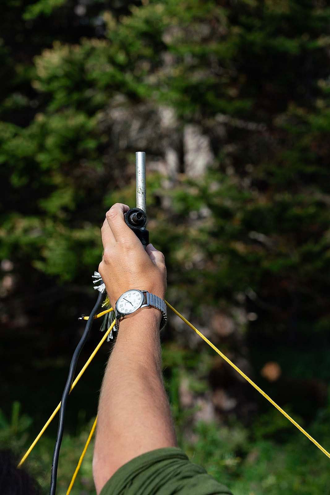 Adjusting where the microphone points.