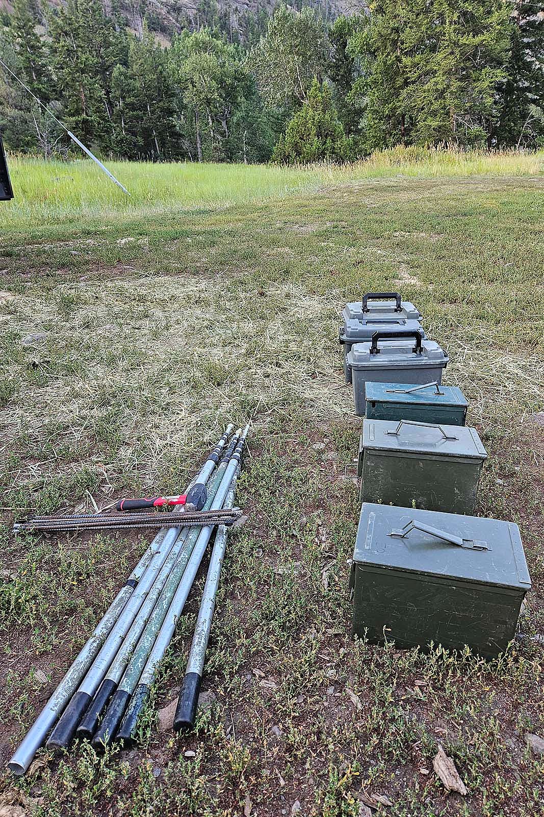 Bat housing units and poles ready to be packed up into the mountains.