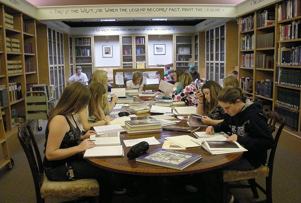 Area high school researchers in the library's reading room
