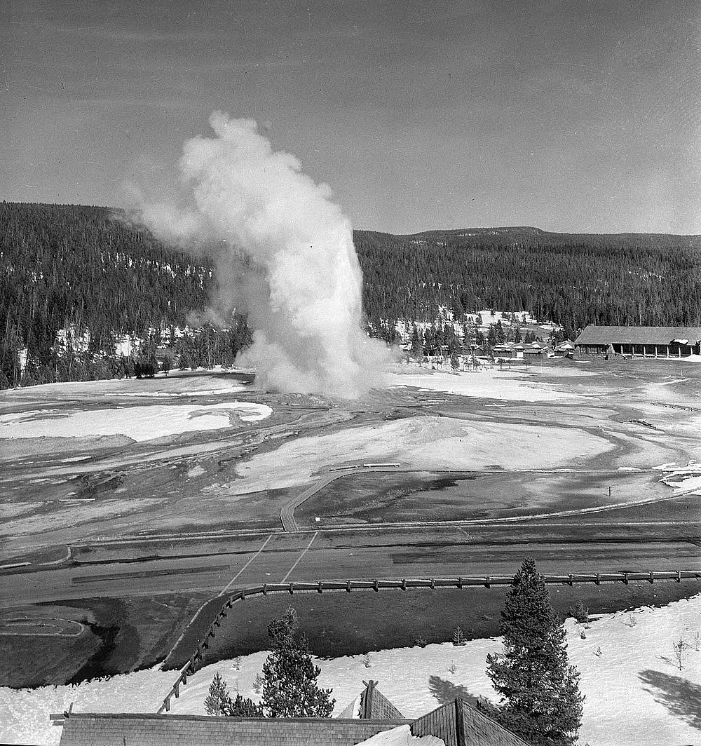 Old Faithful erupting as seen from the widow’s walk atop the Old Faithfull Inn, 1955. MS 89 Jack Richard Photograph Collection, McCracken Research Library. PN.89.10.1657.41