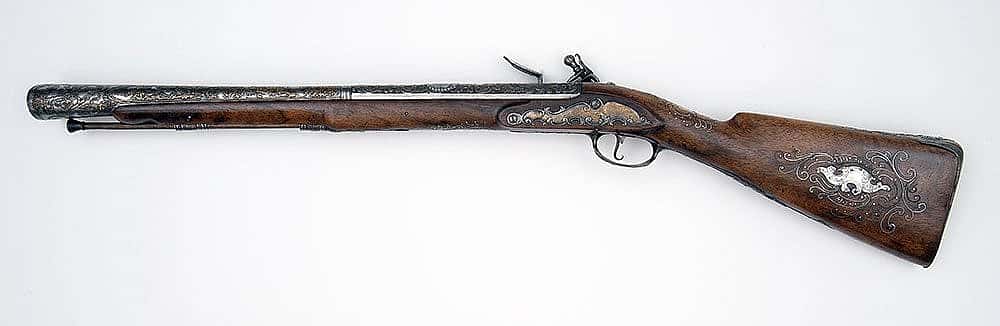 Ornamental blunderbuss, ca. 1760. Tula Arsenal, Russia. Originally presented to Louis XV of France by Catherine the Great. Inlaid with a silver portrait bust of Louis XV forward of the breech. Museum purchase. Partially funded by the James H. Woods Foundation. 1986.16.1