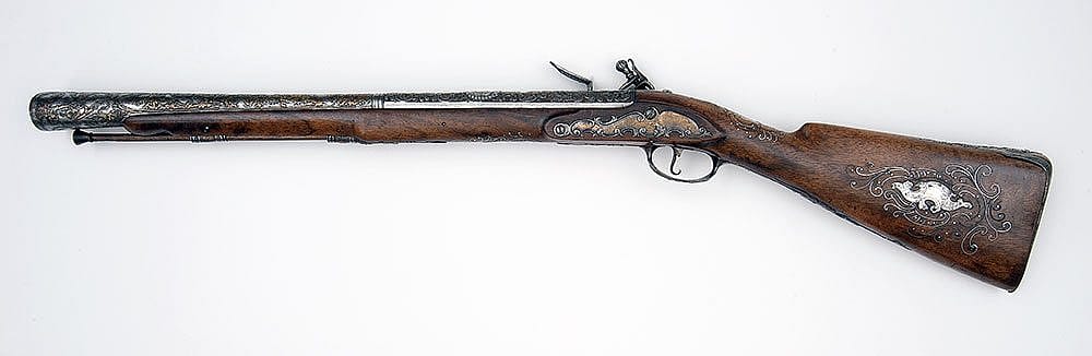 Ornamental blunderbuss, ca. 1760. Tula Arsenal, Russia. Originally presented to Louis XV of France by Catherine the Great. Inlaid with a silver portrait bust of Louis XV forward of the breech. Museum purchase. Partially funded by the James H. Woods Foundation. 1986.16.1