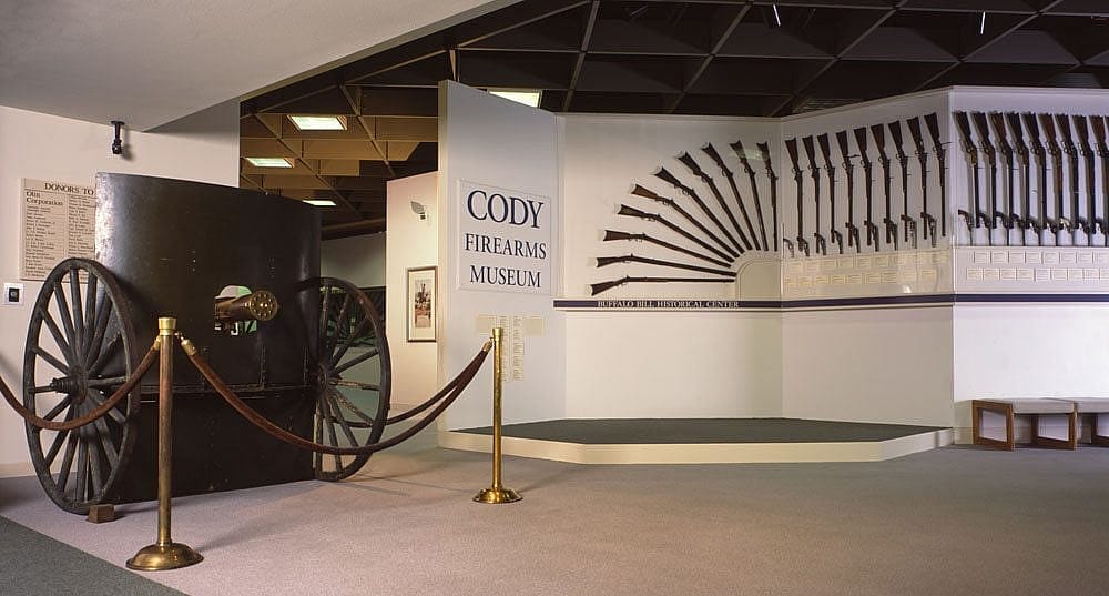 Cody Firearms Museum entrance with gatling gun at the left