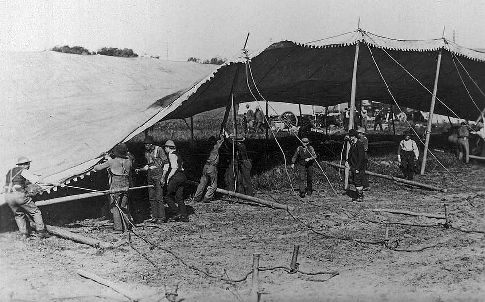 Workmen set up a tent at Buffalo Bill's Wild West, ca. 1895. MS6 William F. Cody Collection, McCracken Research Library. P.6.0228a