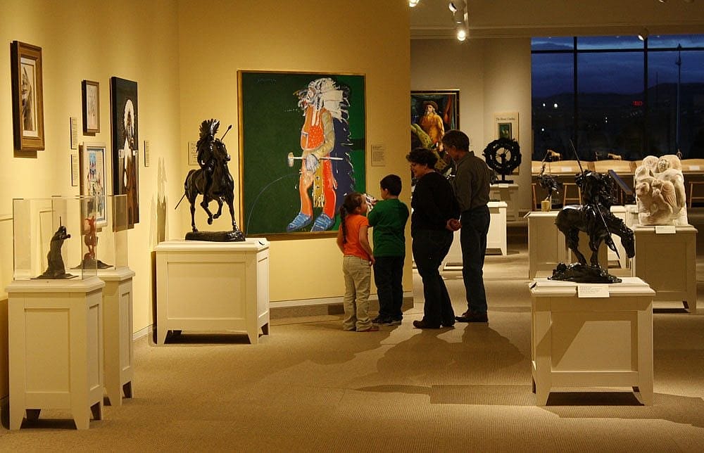 A family enjoys the Whitney Western Art Museum