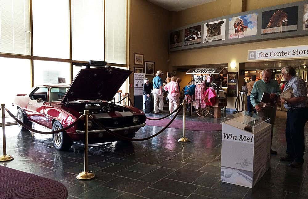 Our two raffle prizes for this year's raffles, a car and a shotgun, grace our front lobby.