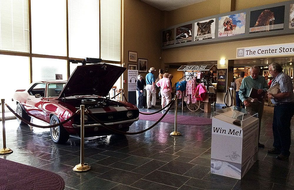 Our two raffle prizes for this year's raffles, a car and a shotgun, grace our front lobby.