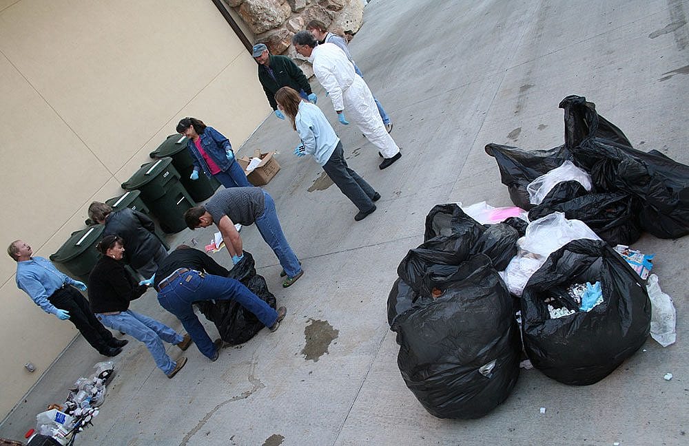 The "Green Team" sorted the garbage to determine how the Center could "reduce, reuse, and recycle."