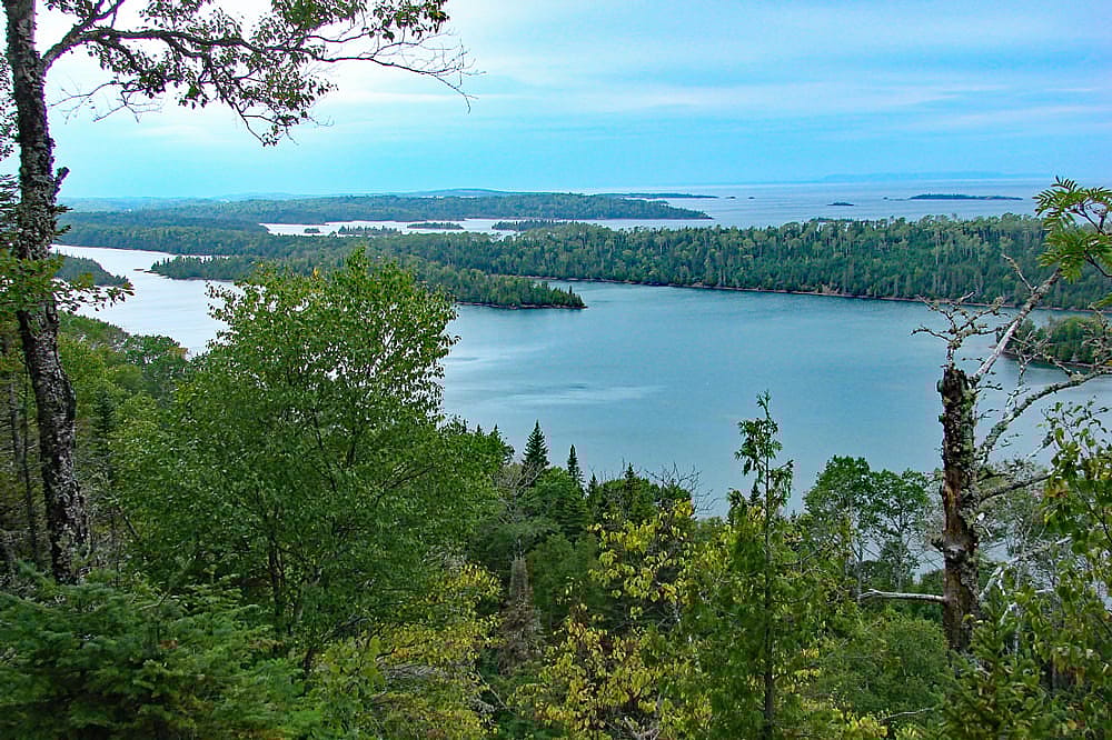Photo taken from a high view across the islands of Isle Royal National Park along the Hidden Lake Trail. This illustrates an area where wolves and ravens live.