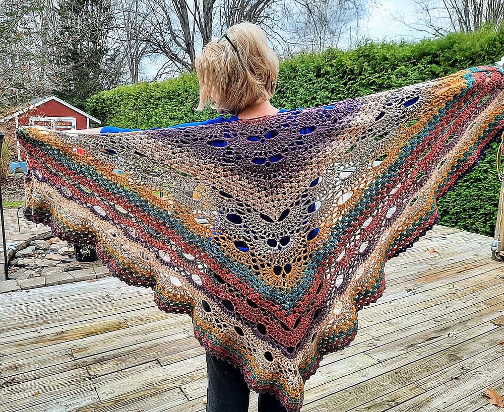 Multi-colored crocheted shawl by Karen Penders St. Clair.