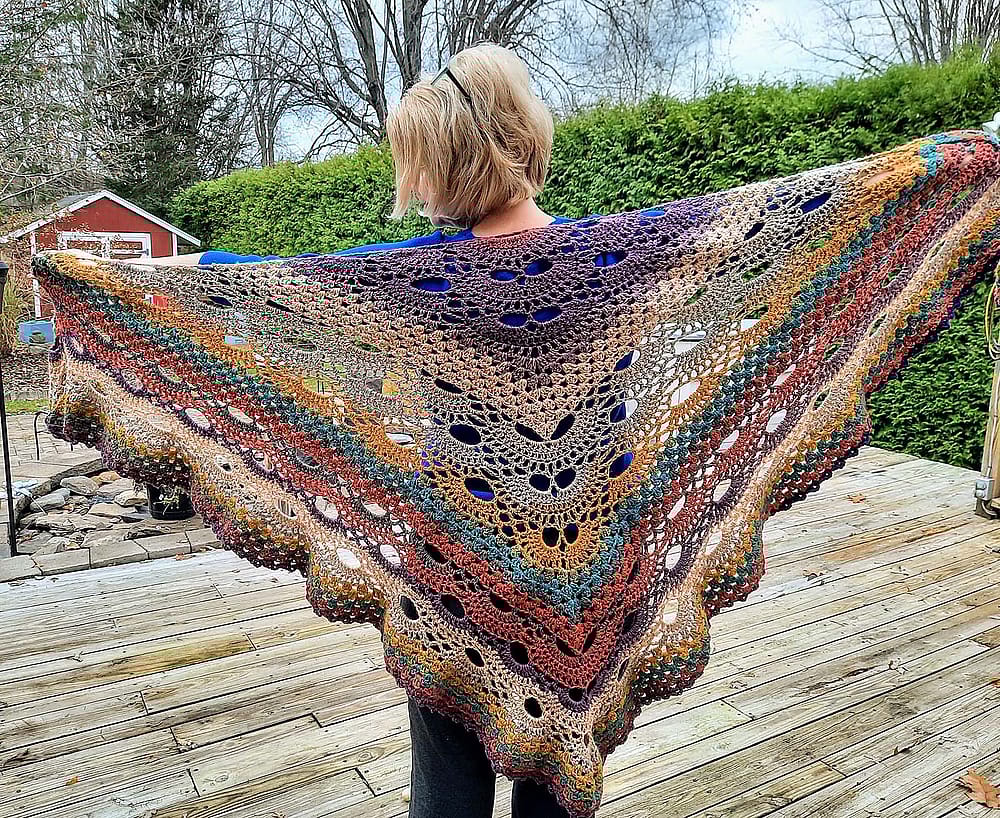 Multi-colored crocheted shawl by Karen Penders St. Clair.