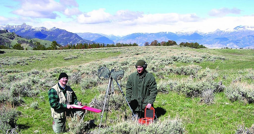 The author (left) and Draper Museum/Northwest College intern Ronnie Hegemann record breeding birds on Carter Mountain near Cody in 2004. Greater Yellowstone Sights and Sounds Archive photo.