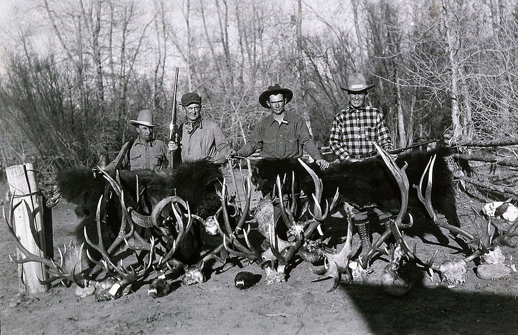 Another successful hunt in the Thorofare for Max Wilde, this time with baseball great Ty Cobb. L to R: Carl Downing, Ty Cobb, Max Wilde, Tris Speaker (Baseball Hall of Fame). Jack Richard photograph of Ty Cobb Hunt, ca. late 1940s. MS 89 Jack Richard Collection. P.89.4331