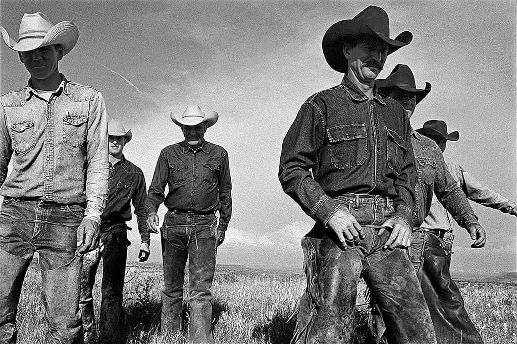 Laura Wilson. Cowboys Walking, J.R. Green Cattle Company Shackelford County, Texas, May 13, 1997. Gelatin silver print, 44 x 66 in. Private Collection.