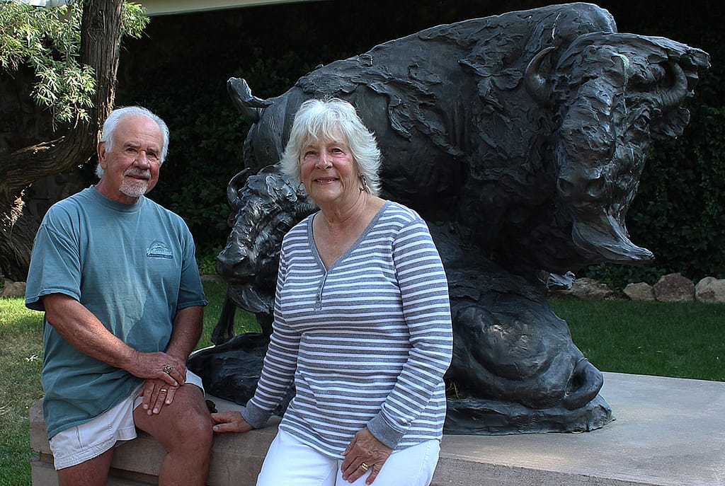 Paul and Karen George in the Center's Braun Garden. T.D. Kelsey's "Change of Seasons." 2.95