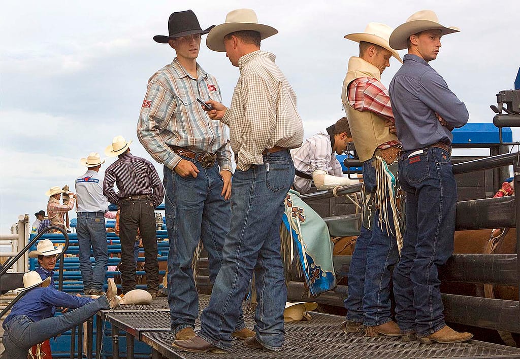 Cowboys waiting on the catwalk at Stampede Rodeo, July 2009. MS 426 Ken Blackbird Collection, McCracken Research Library. P.426.05380