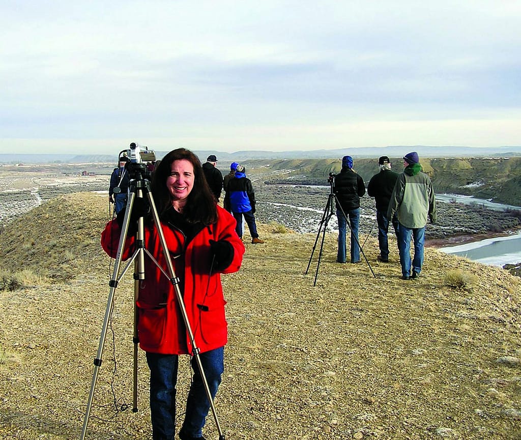 KULR-TV News reporter and Center volunteer Penny Preston documents a Draper Museum field expedition. Greater Yellowstone Sights and Sounds Archive photo.