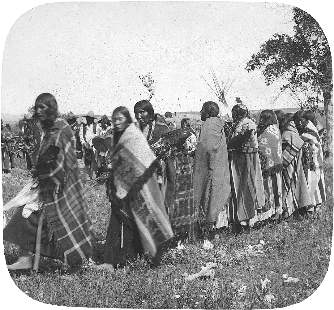 Women lined up for Tobacco Dance ceremony, in Montana, ca. 1903-1925. MS 95 Petzoldt Collection. LS.95.275