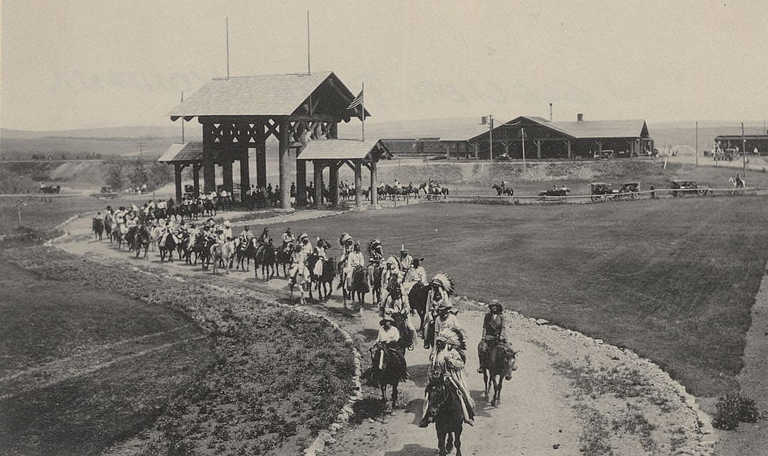 Blackfoot Indians and others participate in ceremonial parade at Glacier National Park, 1910-1920. MS 320 Paul Dyck Plains Indians Buffalo Culture Collection. P.320.138