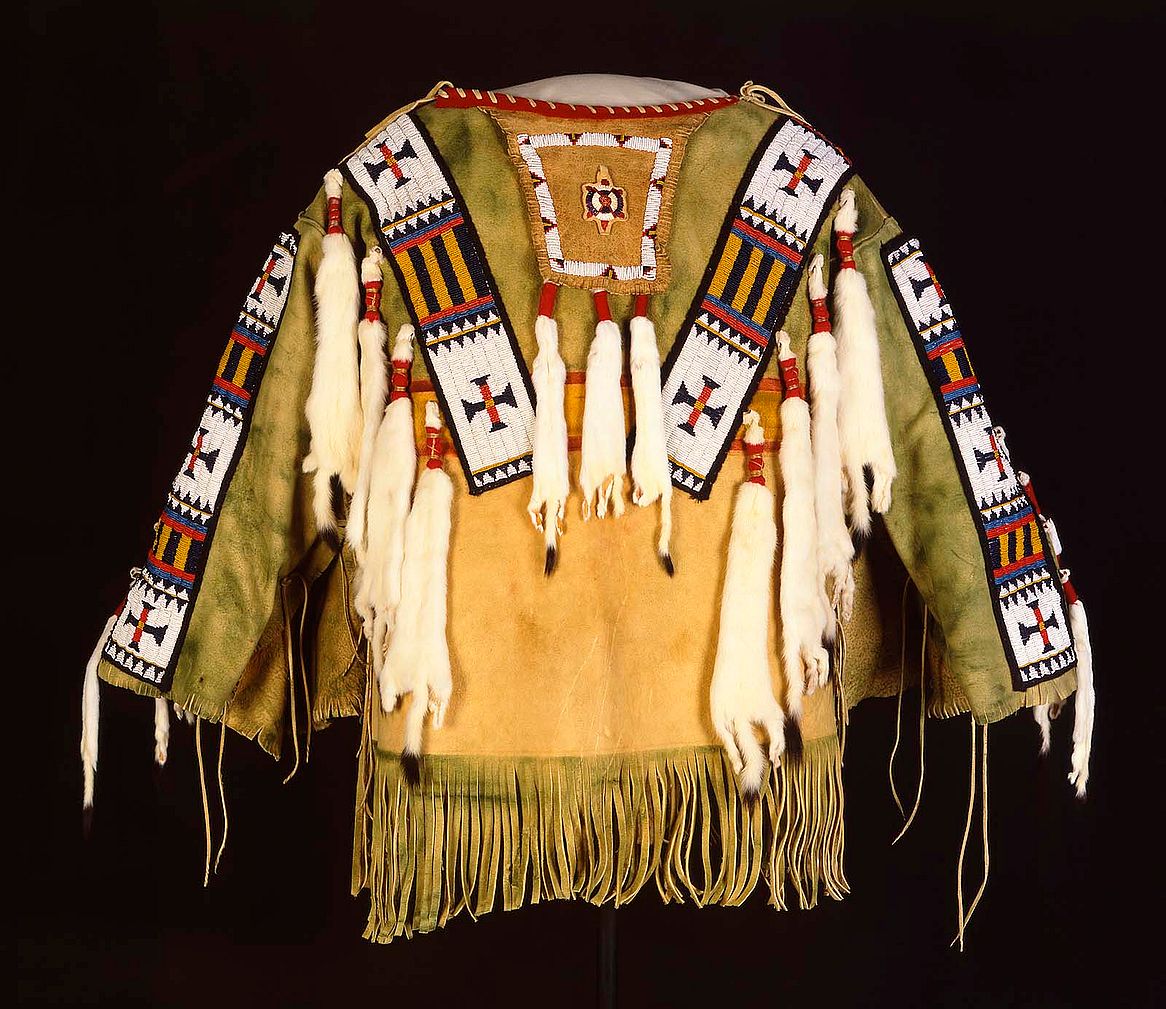 Man's Shirt. Austin Box, Southern Ute, Security, Colorado, 1989. Tanned deer hide, pre-1880 glass beads, seam binding, ermine, dyed porcupine quills, commercial dyes, nylon thread. Gift of Mr. & Mrs. William D. Weiss. NA.202.1007