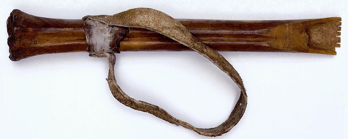 Flesher made from animal leg bone. NA.106.566