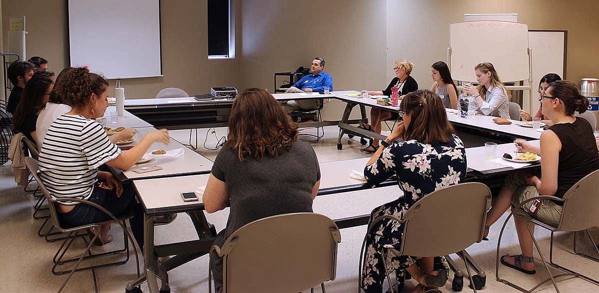 Interns met weekly with the Center's curatorial, education, administration, and museum services departments for in depth conversation about the Center's operation. Here, Dr. Jeremy Johnston talks about his role at the Center as Buffalo Bill Museum Curator and Papers of William F. Cody Editor.