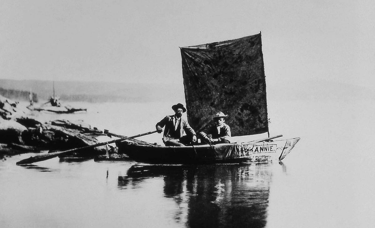The 1871 Hayden survey used this small boat, the "Annie." Artist Henry Elliott and zoologist Campbell Carrington mapped the bays and inlets of Yellowstone Lake in it. W.H. Jackson, 1871. NPS photo.