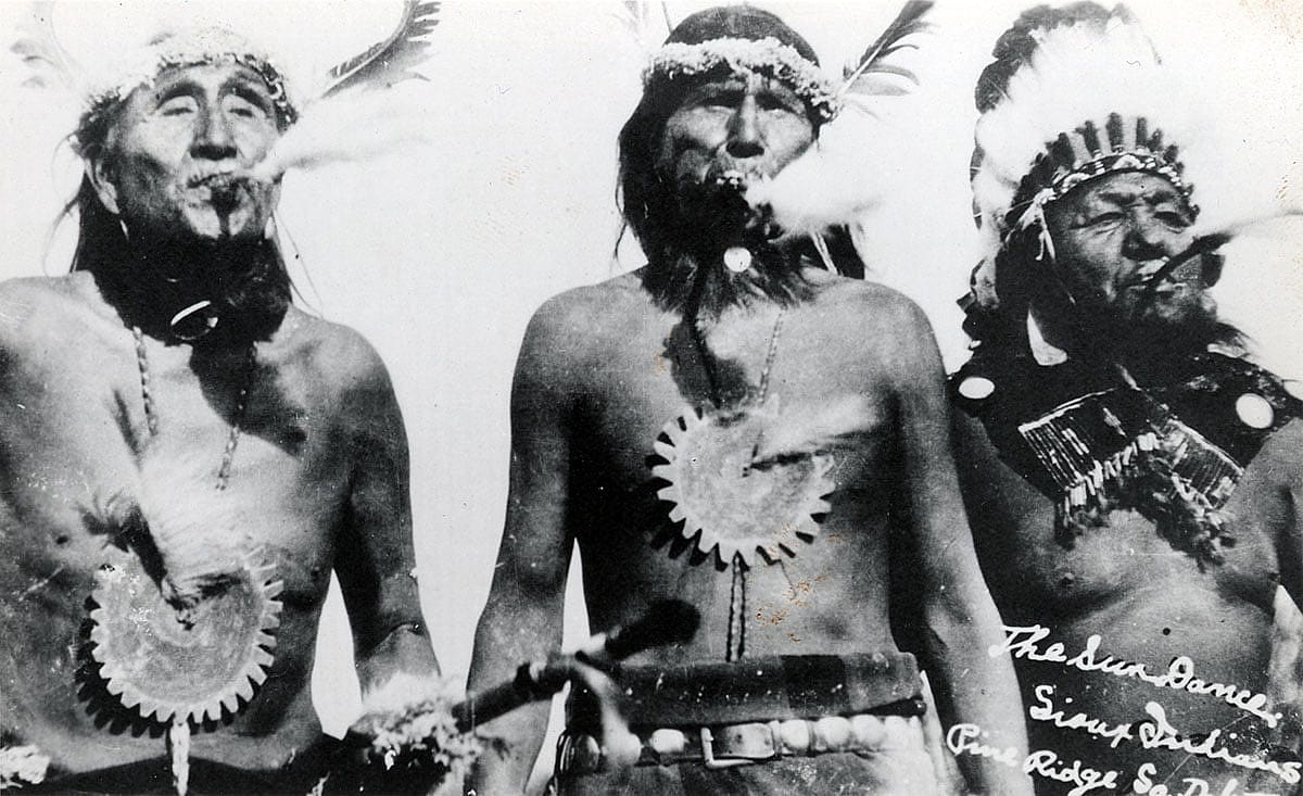 Three Sioux Sun Dance participates with eagle whistles, ca. 1894-1904. MS 320 Paul Dyck Plains Indian Buffalo Culture Collection. P.320.447