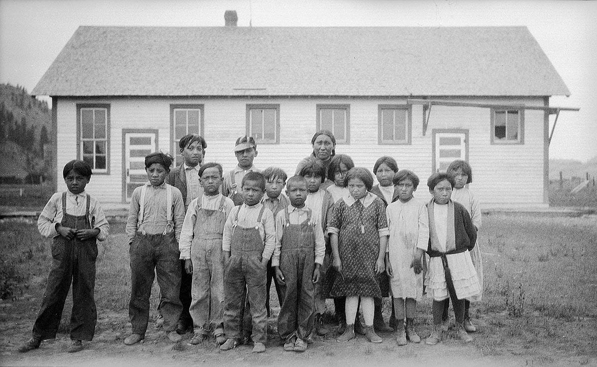 Schoolchildren outside their classroom, Lame Deer, Montana, 1926. MS 165 Thomas Marquis Native American Nitrate Negative Collection. PN.165.2.130