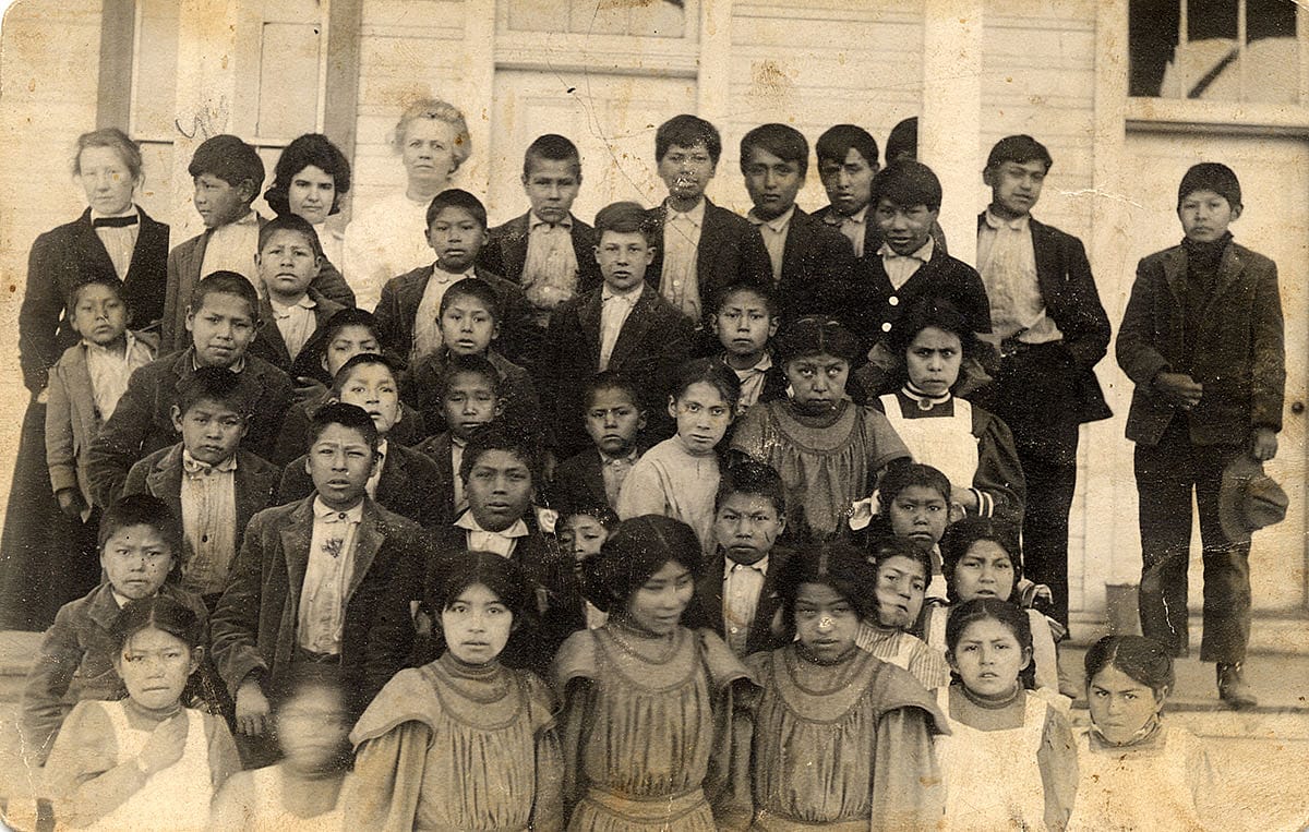 Teachers with Nez Perce students in western clothing, Fort Lapwai, Idaho, ca. 1905-1915. MS 320 Paul Dyck Plains Indian Buffalo Culture Collection. P.320.281