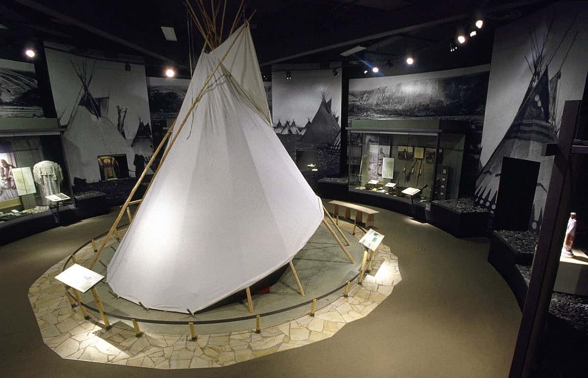 The centerpiece of the Plains Indian Museum's Land of Many Gifts gallery is an Apsaalooke Ashtaale (Crow Lodge or Tipi), one of the most beautiful and practical shelters ever invented. The voice of Alma Snell (Apsaalooke), granddaughter of Pretty Shield, speaks about life in a lodge, and Louella Johnson (Apsaalooke), sings lullabies.