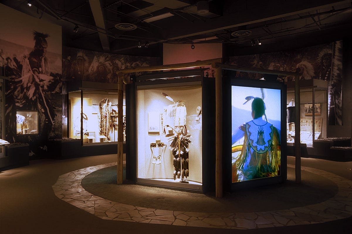 A dance arbor lies in the center of the Plains Indian Museum's Honor and Celebration gallery. There you can experience the Plains Indian Museum Powwow. While the dancers and drums perform, the visitor gets a better understanding of how music and dance are fundamental to Plains cultures.
