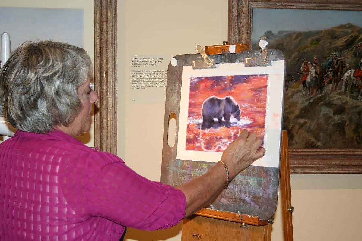 Surrounded by inspiration, Julie Oriet creates an original pastel at the Center during her residency.