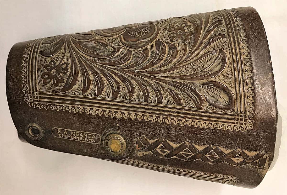 These cuffs are stamped "F.A. Meanea" and were made around 1916. Note the refined and detailed appearance of the carving. This is typical of the work done by this firm at that time. 1.69.1486a/b