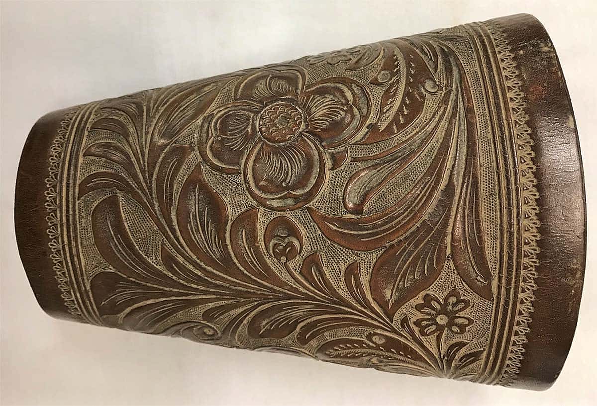 These cuffs are stamped "F.A. Meanea" and were made around 1916. Note the refined and detailed appearance of the carving. This is typical of the work done by this firm at that time. 1.69.1486a/b