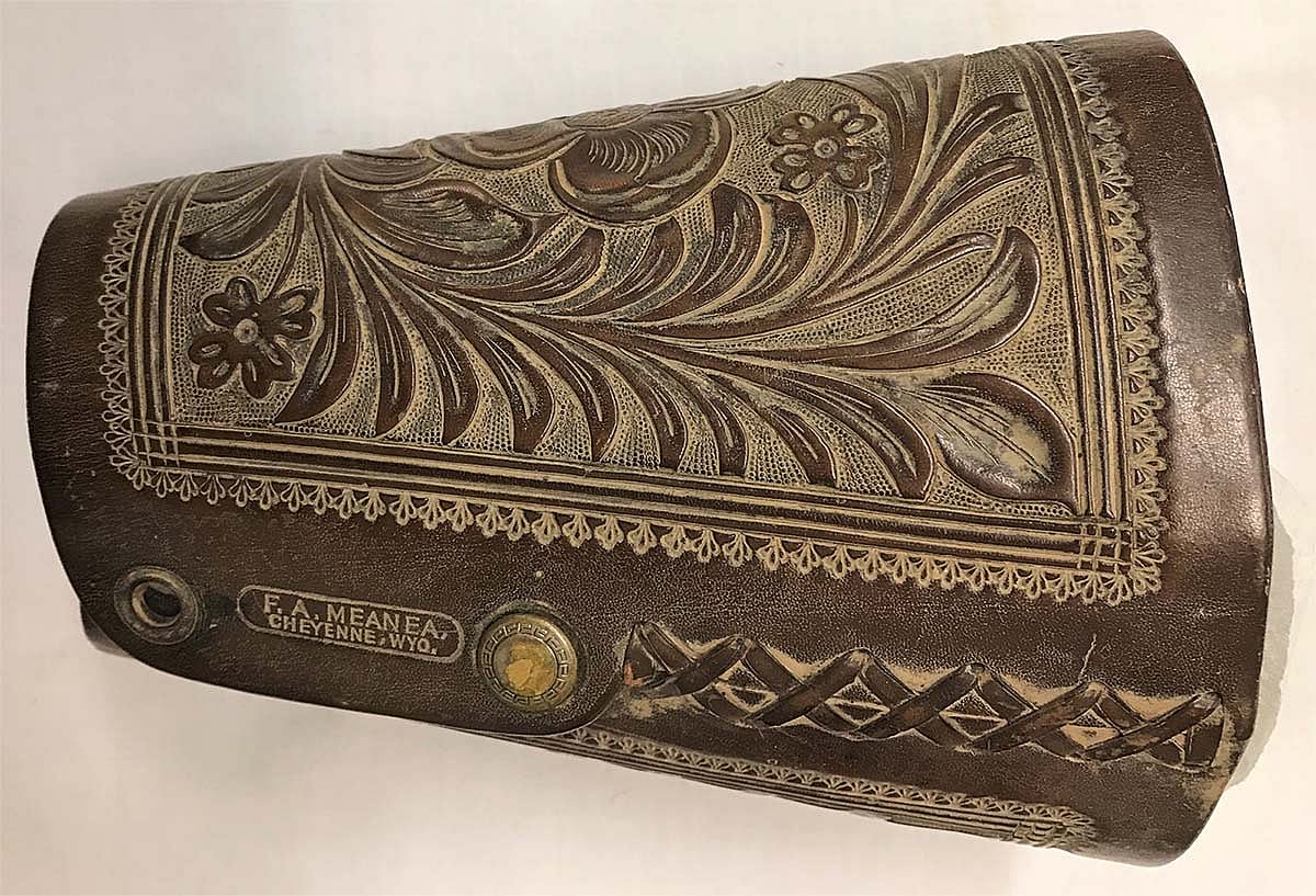These cuffs are stamped "F.A. Meanea" and were made around 1916. Note the refined and detailed appearance of the carving. This is typical of the work done by this firm at that time. 1.69.1486a/b