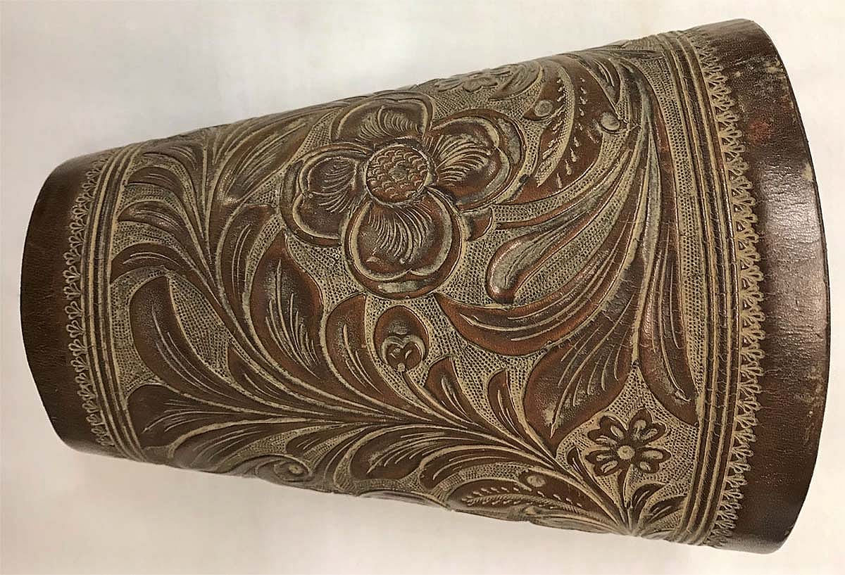 These cuffs are stamped "F.A. Meanea" and were made around 1916. Note the refined and detailed appearance of the carving. This is typical of the work done by this firm at that time. 1.69.1486a/b
