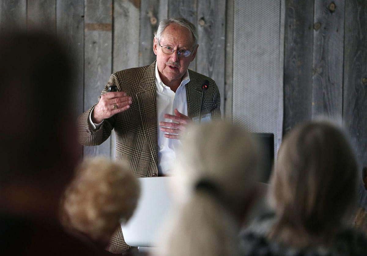 Peter Hassrick speaking before a group of people.