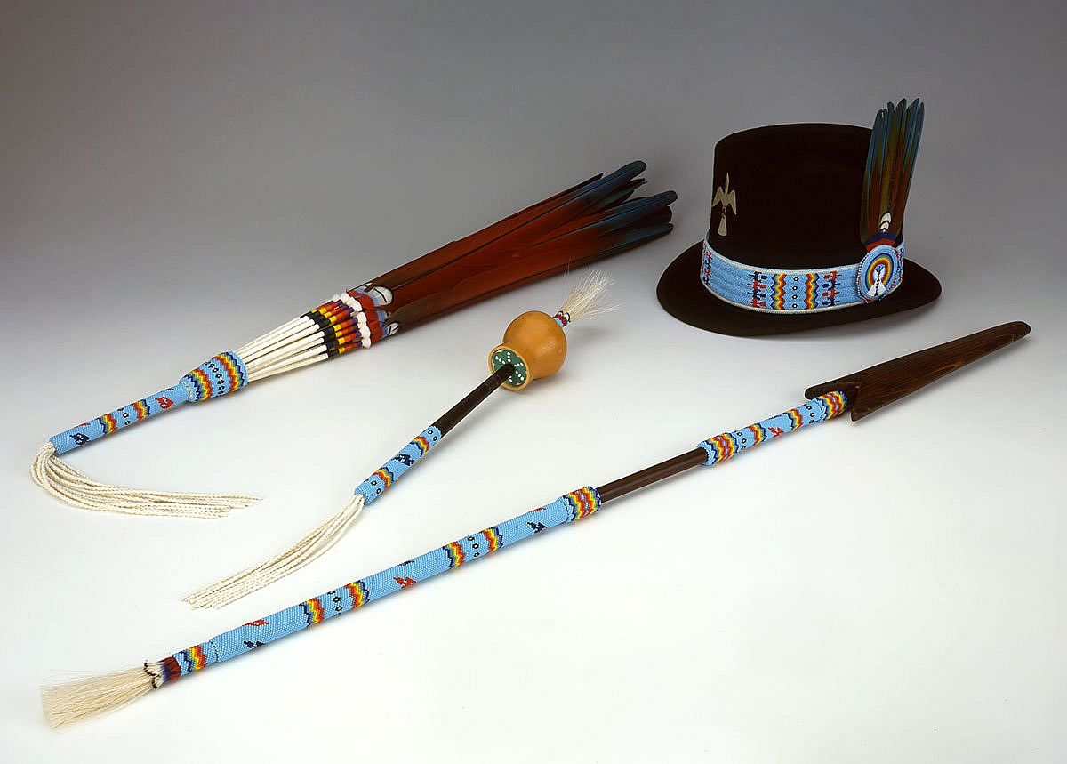 Native American Church set, 1998. Made by Emil Her Many Horses, Oglala Sioux. Feathers, glass beads, deer hide, metal, string. Gift of the Pilot Foundation. NA.502.215.1, .3, .4, and .5