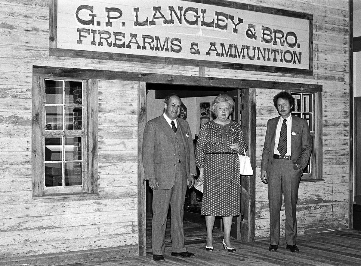 Attending the July 4, 1976, opening of the Center's then Winchester Arms Museum are (L-R) Wyoming Governor Stan Hathaway, Trustee Chair Margaret "Peg" Coe, and Executive Director Peter Hassrick. P.20.4649