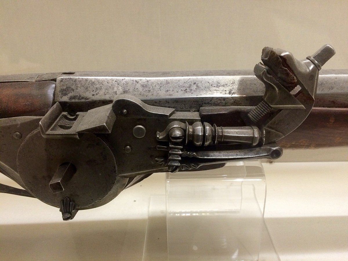 Evolution of Wheellock. This French Wheellock Hunting Gun was made for King Louis XIII and kept in his personal collection. This gun is 6 feet 8 inches at 26 pounds. Gift of Olin Corporation, Winchester Arms Collection. 1988.8.1151