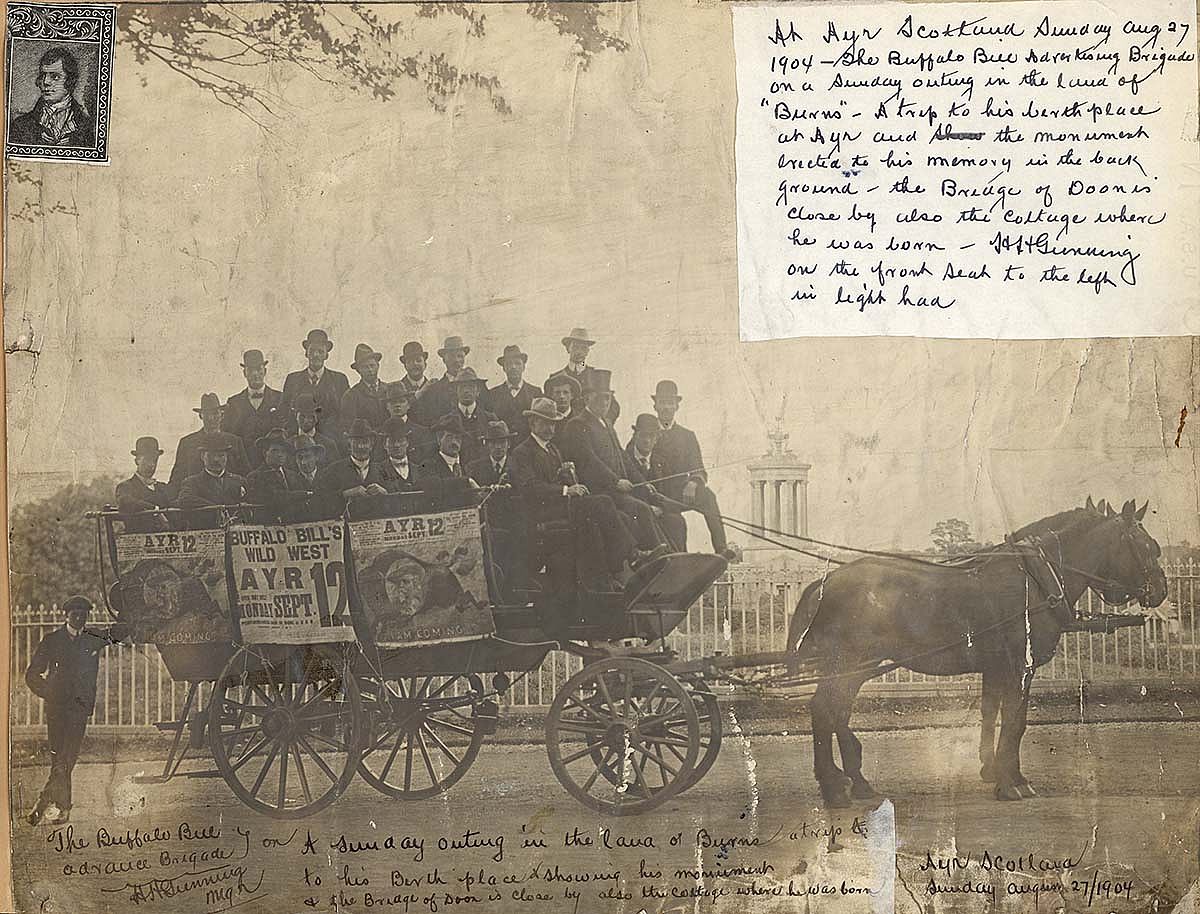 Three weeks after the Glasgow run, Buffalo Bill's Wild West "advertising brigade," pictured here, coordinated details for the Wild West's venue in Ayr, Scotland, "the county town for where we live" says author Cunningham. This image is from the Harrison H. Gunning scrapbook; Gunning was at one time one of the Wild West's advertising agents. Note attached reads: "The Buffalo Bill advertising brigade. H.H. Gunning on right. A Sunday outing in the land of Burns a trip to his birth place showing his monument & the Bridge of Doon is close by also the cottage where he was born. Ayr Scotland Sunday August 27 1904." MS6 William F. Cody Collection, McCracken Research Library. MS6.3678.092.00